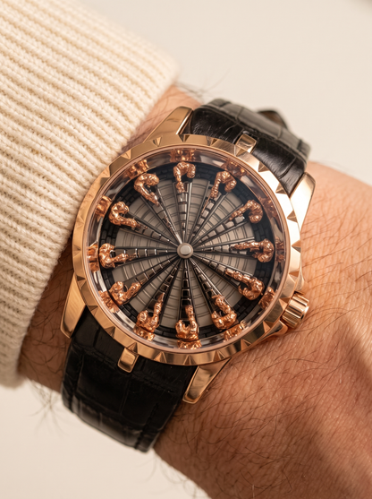 Montavier rose gold knights watch on wrist, cream knit