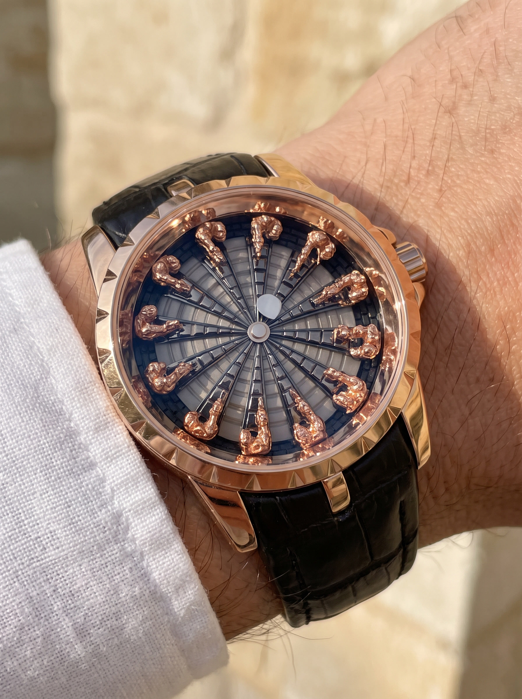 Montavier rose gold knights watch on wrist, white linen